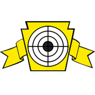 A shooting target inside a yellow keystone with a yellow ribbon behind.